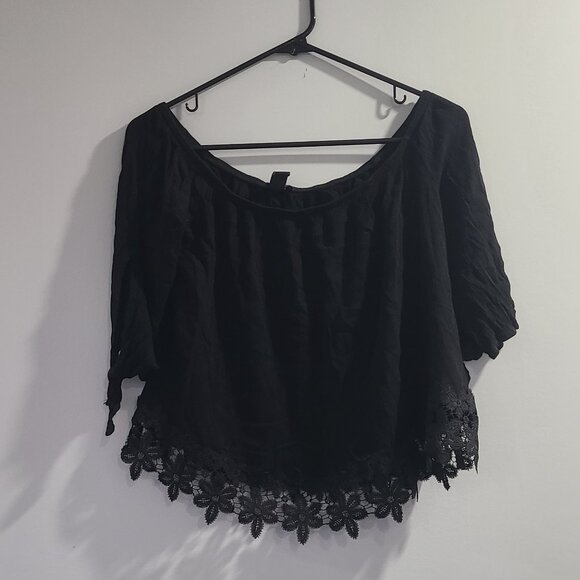 Black crop blouse with lace bottom detail and peekaboo sleeve. Like new - Picture 1 of 5